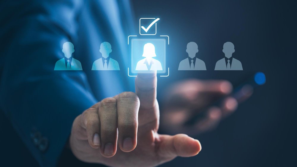 Hand selecting a highlighted candidate from a lineup of virtual profiles.